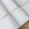 Obrus Madele 145x260 biały ze złotą lamówką